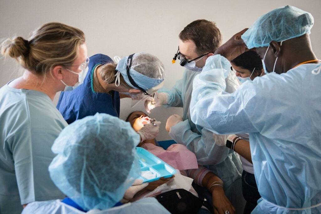 Dental professionals collaborating during community outreach