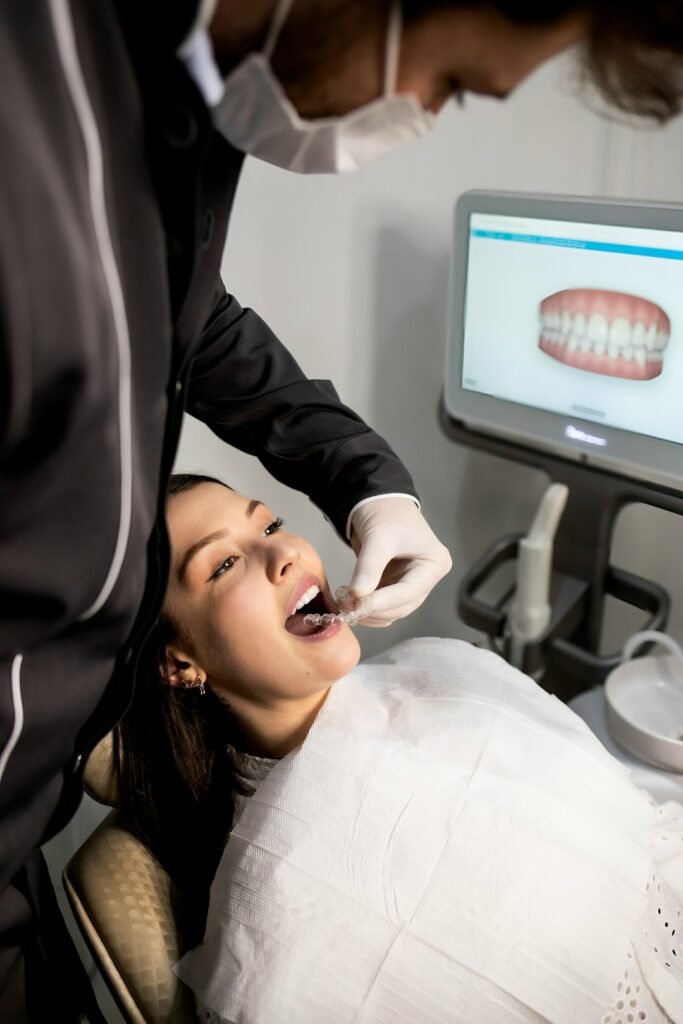 Dental professional examining a patient